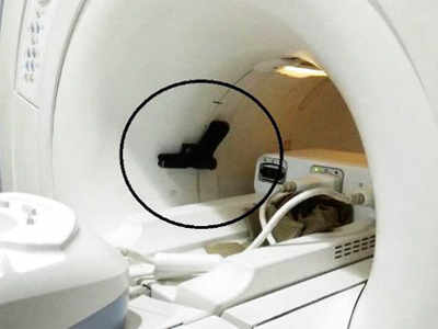 Guard carries gun during minister’s MRI scan, monster magnet sucks in weapon