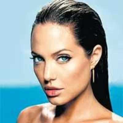 Angelina hates being labelled '˜Mother Teresa'