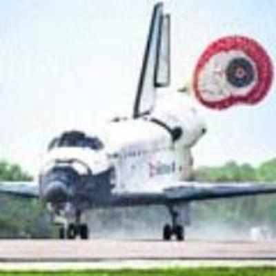 Shuttle Discovery returns to Earth; astronauts can't forget the '˜space odour'