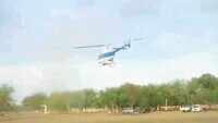 Helicopter sprays pesticide in Jodhpur as to control locust population 