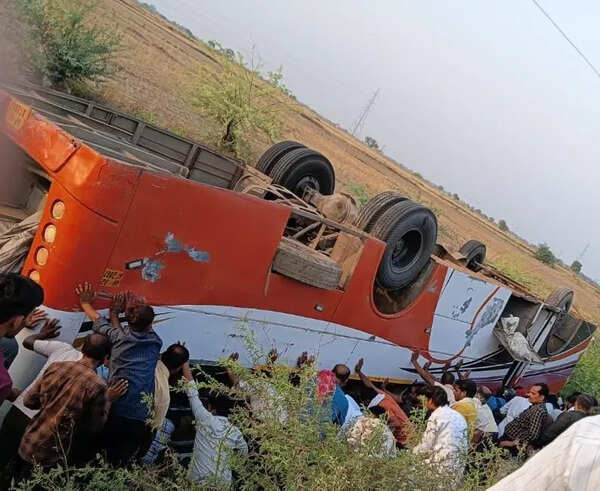 Woman killed, over 20 injured after pvt bus overturns into roadside ditch
