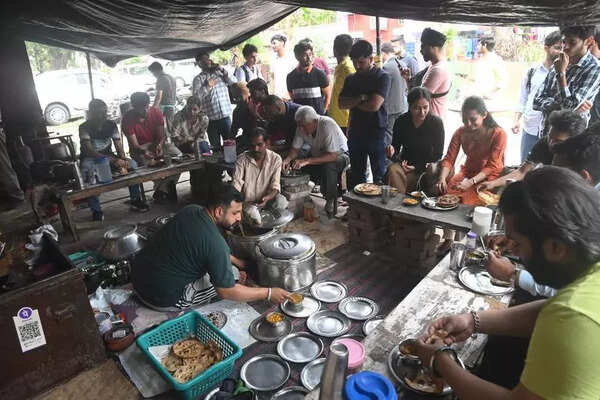As cooking fires cool, wood helps PU dhaba keep hearth burning
