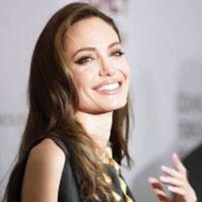 Jolie sued by journo for copyright violation