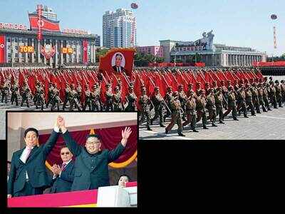 N Korea holds military parade without missiles