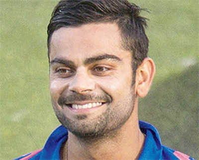 Injured Dhoni out of Asia Cup; Virat to lead