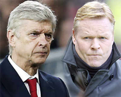 Wenger involved in tunnel bust-up with Koeman
