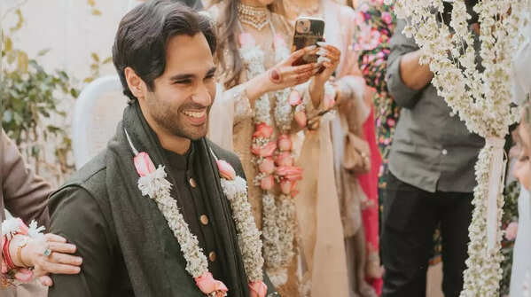 Groom's charcoal grey salwar kameez