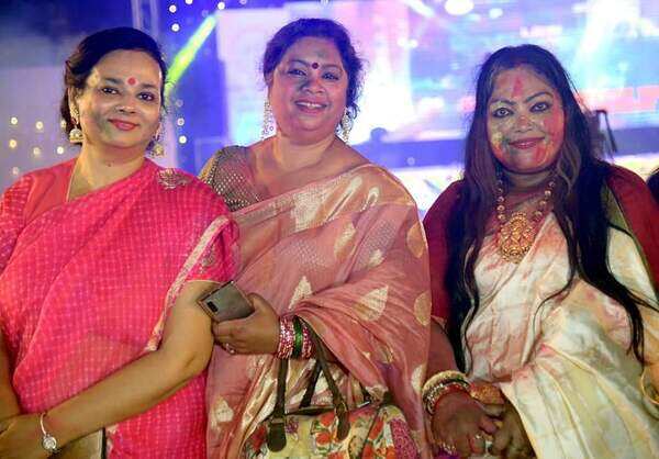 Members of a club celebrate Holi with much enthusiasm