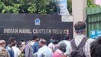 People violate social distancing norms to buy essentials at Indian naval canteen in Visakhapatnam 