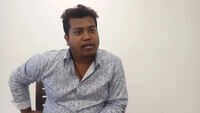 Watercolor Artist Nirupam konwar on the canvas used for watercolour painting 
