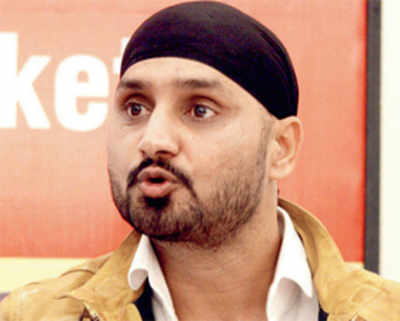 Branded a racist by Harbhajan, fired Jet pilot files $15-mn suit