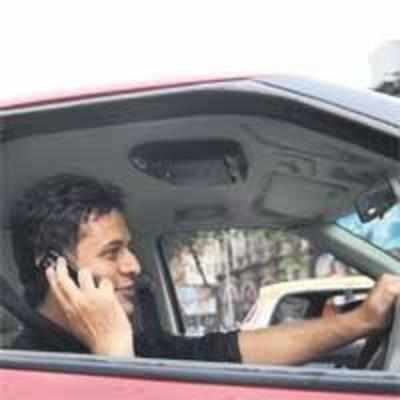 Phone vex: lose licence if caught talking, driving