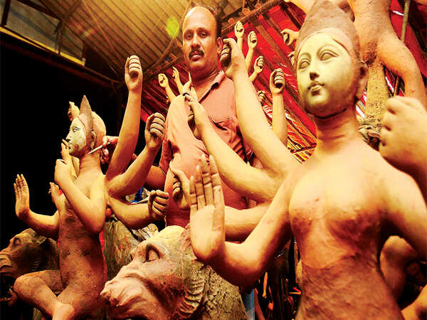 In the land of Mhadei, Ganges clay contours Durga