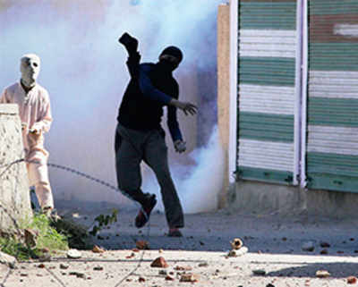 50 injured as protesters torch DM’s office in Kashmir