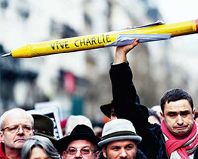 One year on, Charlie Hebdo vows to stay alive