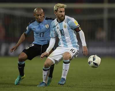 Messi strikes back as Argentina sink Uruguay