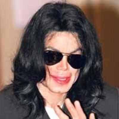 Whacko Jacko sued for taking bed from dying woman