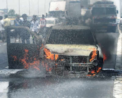 Car catches fire on WEH