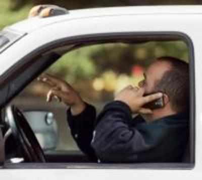 Use your cellphone, but lose driver's licence