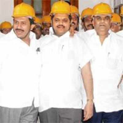 JDS MLAs wear helmets to Vidhan Soudha