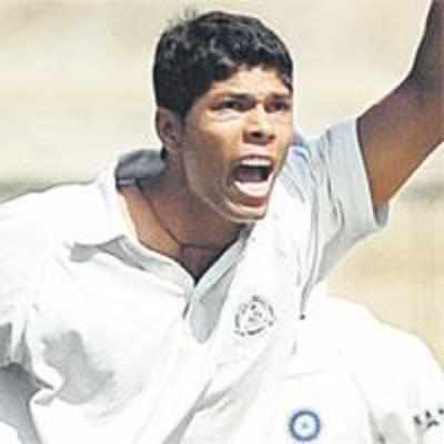 Rookie Yadav picks five as Karthik's ton takes South to 329