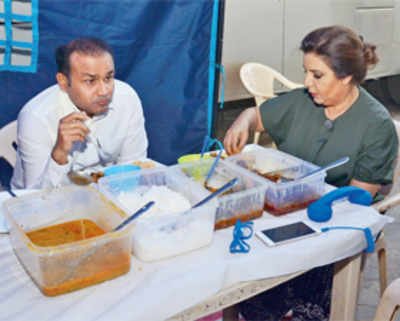 Virender Sehwag enjoys a home-cooked meal with Farah Khan on the sets of Indian Idol