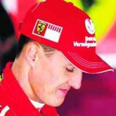 Desperate measures: Schumi visits Senna grave