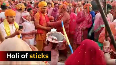 Lathmar Holi celebrations: Women beat up men with sticks at ...