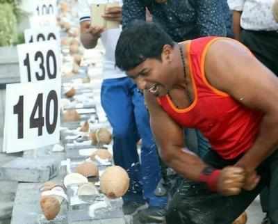 Kerala man smashes 124 coconuts with bare hands within a minute