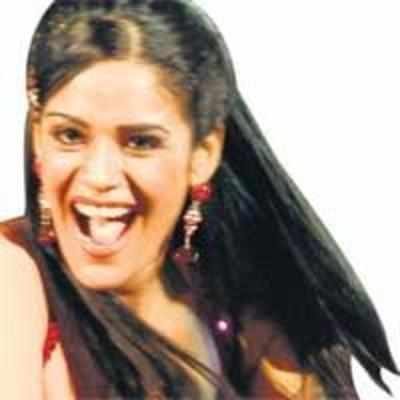 DING DONG, MONA SINGH A SONG!