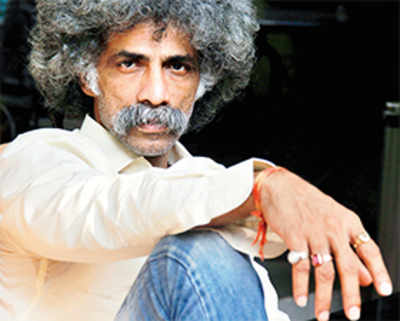 Small talk: The filmy gangster is on the run