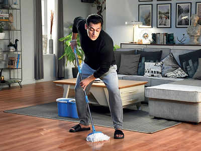Salman Khan kicks off Bigg Boss Season 14 by mopping the floor, a reflection of the new normal