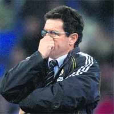 Capello looks for positives after loss