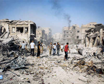 31 dead as Syrian jet crashes into market