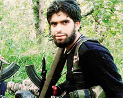 Cornered by army, Hizbul militant surrenders in J&K