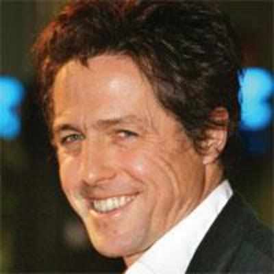 Hugh Grant's baby named Happy Accident
