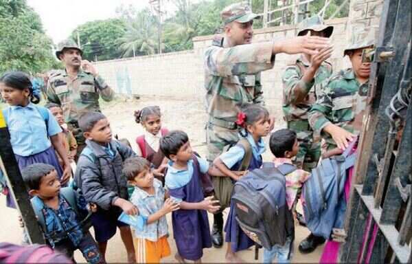 Students, parents stand off against Army to save school
