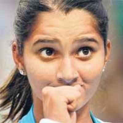 Paes through, rain halts Sania's doubles