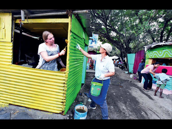 Pune: Dutch teen’s paint, brush add colours to Kalyaninagar slum