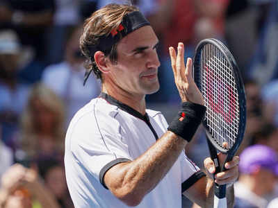 Federer razor sharp in easy win over Evans