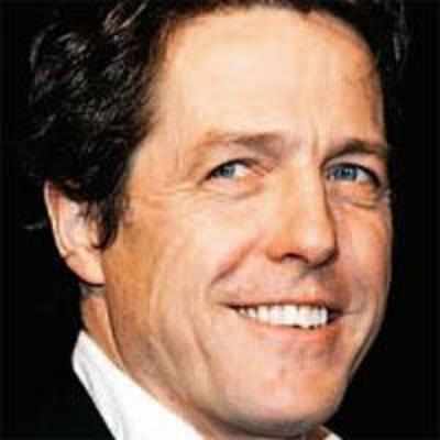 Hugh Grant taken to hospital