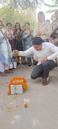 Work starts to lay block tiles on unpaved road in Sector 84