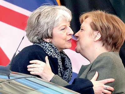 May seeks Brexit delay from Merkel, Macron
