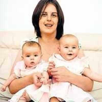 Born minutes apart to same mum, but these sisters are NOT twins