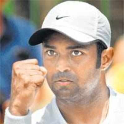 Paes through to second round