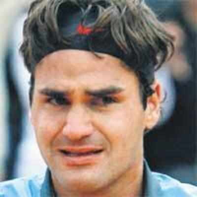 Federer admits he can't hold tears