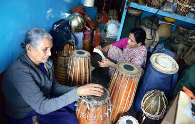 The lady of Mridangam street