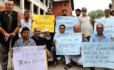 Kashmir civil society members stage protest against killing of Amarnath pilgrims