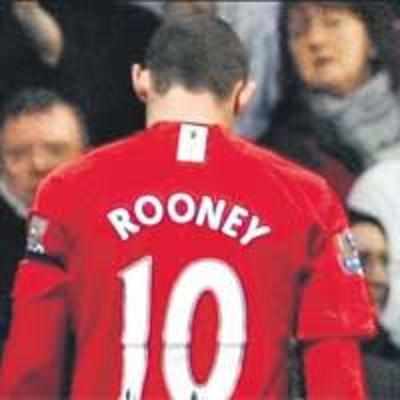 United win but lose Rooney for three weeks