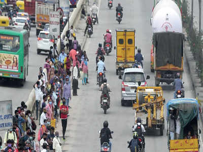 Buses drive by as covid norms limits passengers